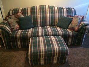 Hide-a-bed Couch and ottoman.