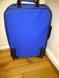 Med size luggage with wheels and handle