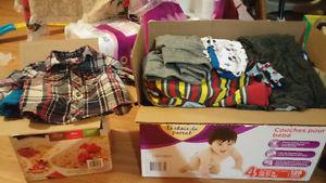 Two boxs of baby boy clothes