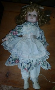 4 Vintage porcelain dolls