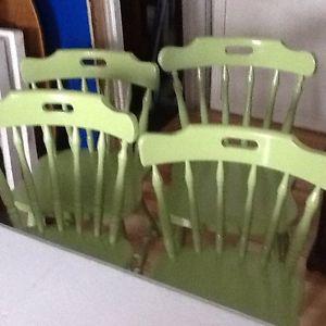 4 green chairs