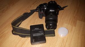 Nikon D with lens and camera bag