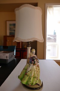 Table lamp, lady in green dress with flowers.