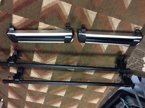 Thule roof rack with Ski attachments.