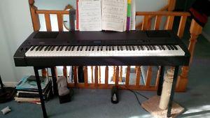 Yamaha P-200 digital piano, case and stand