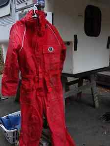 large marine suit and 2 med to large life vests