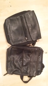 2 Fossil purses one black and one brown.