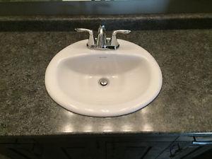 Bathroom counter, sink and faucet