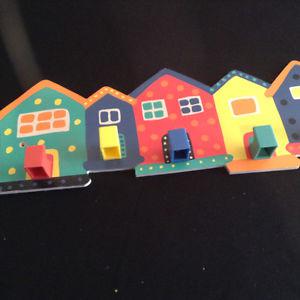 Colourful house hanger and wine cosy