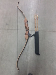 Recurve bow with some arrows