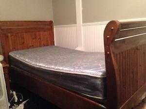 Single wooden sleigh bed