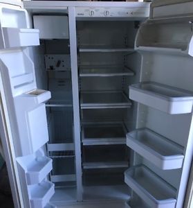 Whirlpool side by side fridge/freezer