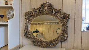 Beveled oval accent mirror