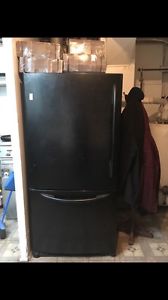 Black General Electric fridge