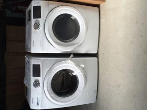 Brand new Samsung front load washer and dryer