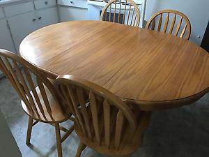 Solid wood table and four chairs