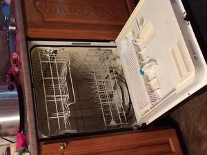 Whirlpool stove and dishwasher for sale.