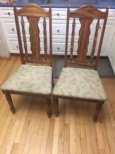 2 solid oak dinning chairs