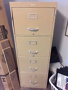 Four drawer letter filing cabinet