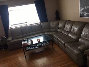 Large beige leather sectional