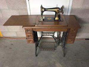  Treddle Singer Sewing Machine in oak cabinet