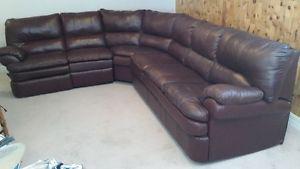 Leather sectional with queen hide-a-bed and two loungers.