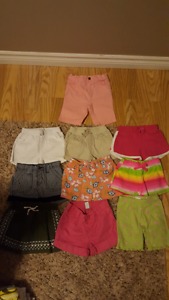 Lot of toddler girl shorts and a skirt.