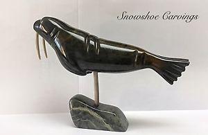 Swimming walrus - soapstone carving