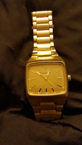 Gold nixon watch for sale $250 obo or trade for something
