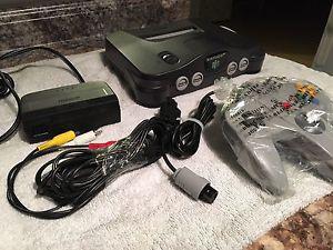 N64 - console/cables/controller GOOD JOYSTICK TIGHT!