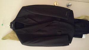 New!! Mens size  black suit. Tags attached