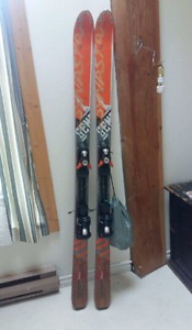 Touring skis with skins and bindings