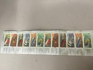 12 Intact Fly fishing stamps
