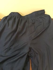 2 pairs of men's training pants sizes small and xl