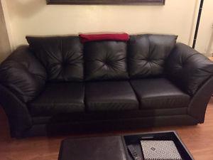 Black faux leather couch/ sofa