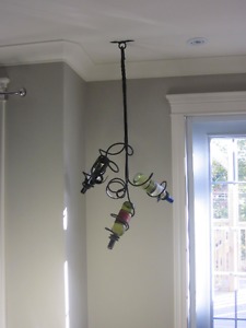 Custom made hanging wrought iron wine rack