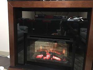 Entertainment table with electric fireplace