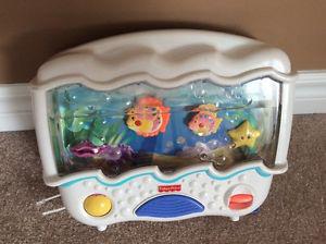 Musical crib aquarium