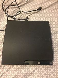 PS3 in  condition comes with charging pad and