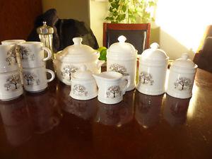 Soup tureen, 6 mugs canesters and cream and sugar