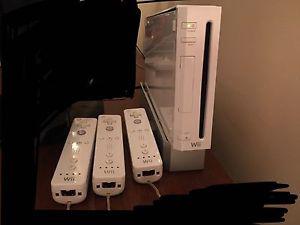 Wii with controllers and 8 games