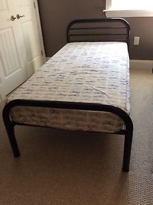 2 single beds with mattresses