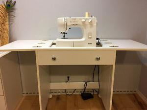 Sewing Machine with fold-up sewing machine table