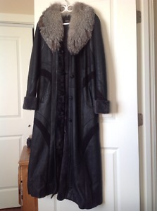 Sheep skin lady's coat with fur collar, L size for $