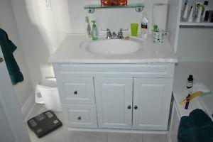 bathroom vanity sink and cupboards