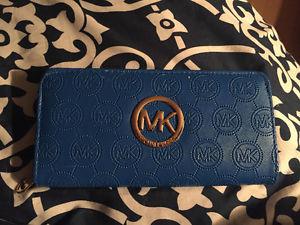 2 Micheal Kors wallets (not genuine)