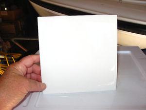6"x6" shiny white ceramic tiles at 25 cents/ea. in Blind