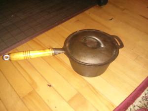 Cast iron saucepan with lid