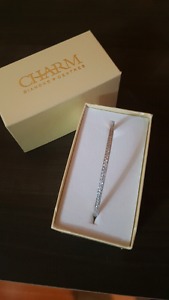 New in box Sterling silver bangle from Charm. Reg 109 plus