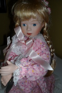 Porcelain "Sarah" Doll with authentic papers.